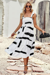 Robe imprimée à smocks et épaules nouées